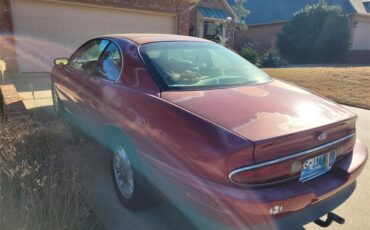 Buick-Riviera-1995-Red-Patina-finish-Tan-leather-13