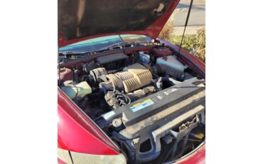 Buick-Riviera-1995-Red-Patina-finish-Tan-leather-16