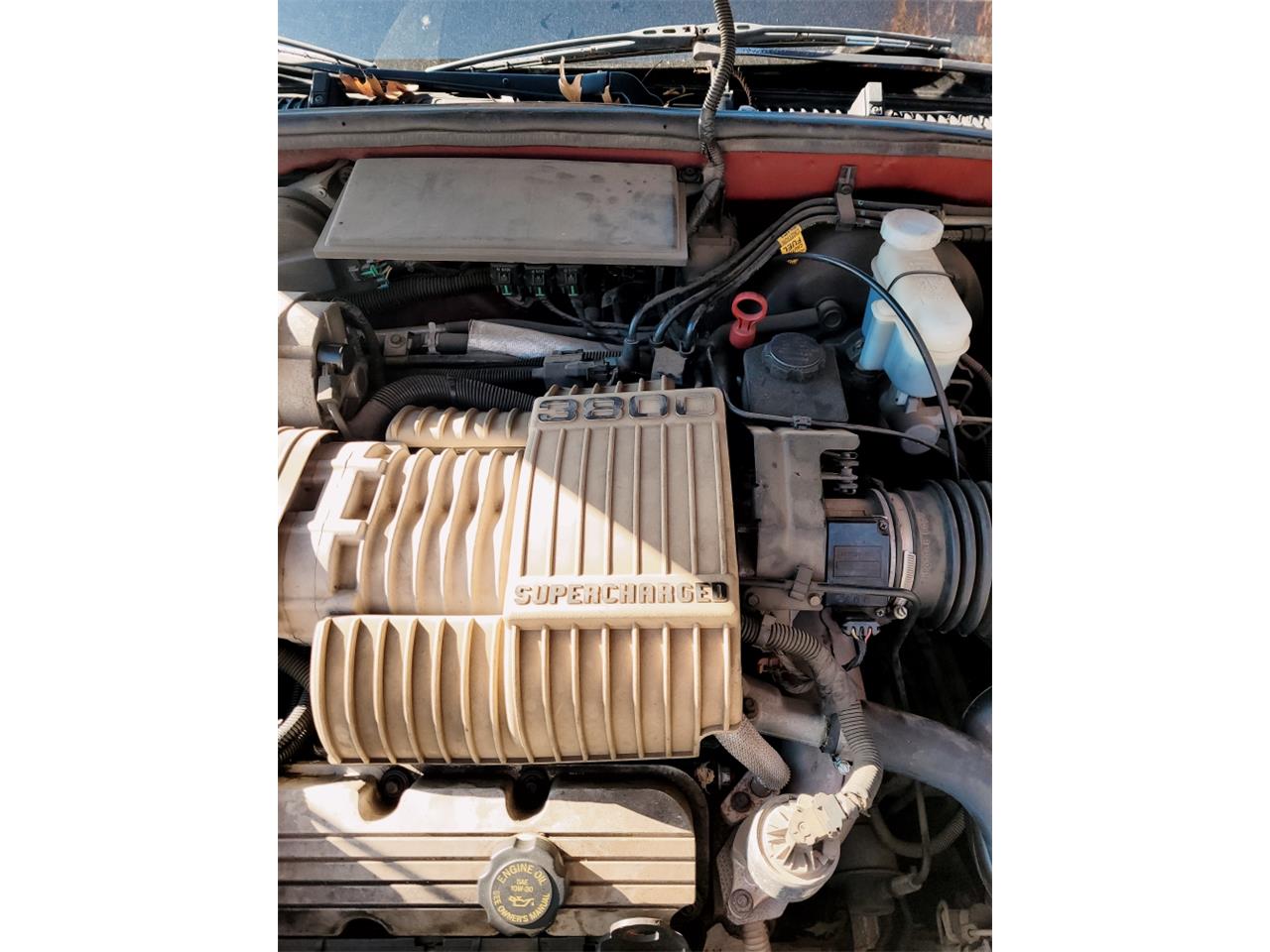 Buick-Riviera-1995-Red-Patina-finish-Tan-leather-17