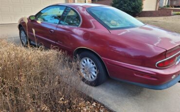 Buick-Riviera-1995-Red-Patina-finish-Tan-leather-19