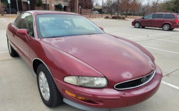 Buick-Riviera-1995-Red-Patina-finish-Tan-leather-22