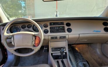 Buick-Riviera-1995-Red-Patina-finish-Tan-leather-26