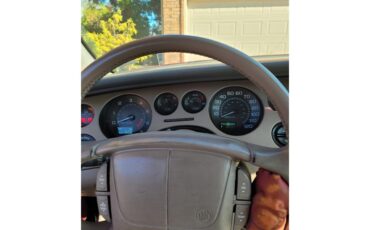 Buick-Riviera-1995-Red-Patina-finish-Tan-leather-27