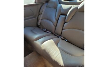 Buick-Riviera-1995-Red-Patina-finish-Tan-leather-28