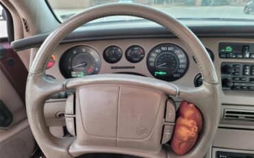 Buick-Riviera-1995-Red-Patina-finish-Tan-leather-29