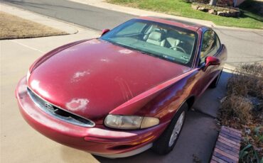 Buick-Riviera-1995-Red-Patina-finish-Tan-leather-4