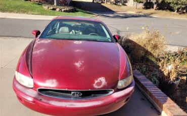 Buick-Riviera-1995-Red-Patina-finish-Tan-leather-5