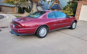 Buick-Riviera-1995-Red-Patina-finish-Tan-leather-7