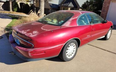 Buick-Riviera-1995-Red-Patina-finish-Tan-leather-8