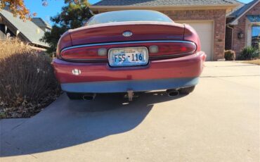Buick-Riviera-1995-Red-Patina-finish-Tan-leather-9