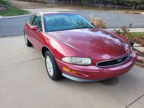 Buick-Riviera-1995-Red-Patina-finish-Tan-leather