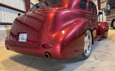 Buick-Sedan-1940-Red-Tan-1