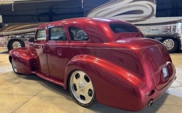 Buick-Sedan-1940-Red-Tan-14