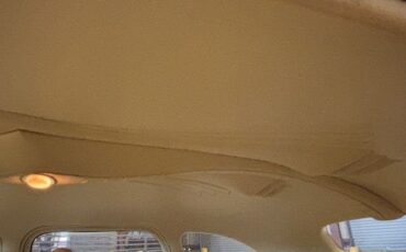 Buick-Sedan-1940-Red-Tan-25