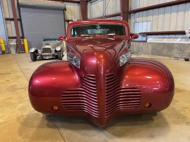 Buick-Sedan-1940-Red-Tan-26