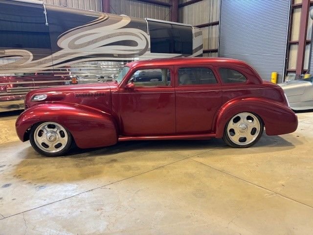 Buick-Sedan-1940-Red-Tan-4