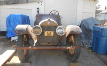 C55-7-passenger-touring-1915-brown-1