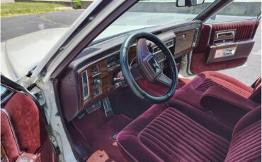 Cadillac-Brougham-1988-White-Maroon-11