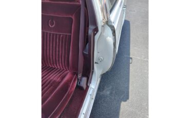Cadillac-Brougham-1988-White-Maroon-13