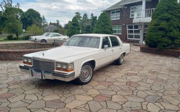 Cadillac-Brougham-1988-White-Maroon-5