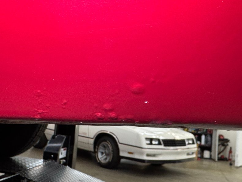 Cadillac-Deville-1966-Flamenco-Red-Metalli-Black-ampamp-White-33