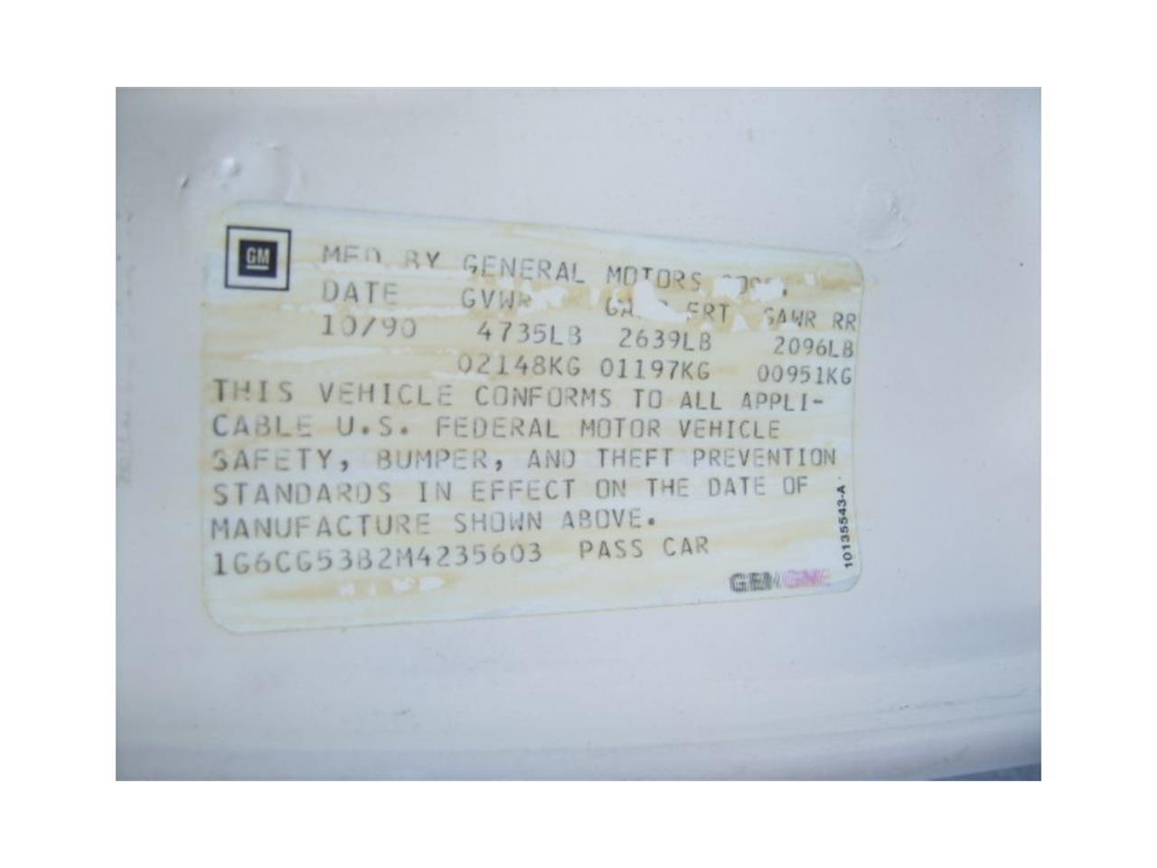 Cadillac-Fleetwood-60-special-1991-White-Gray-13