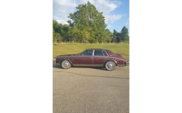 Cadillac-Seville-1984-Burgundy-Burgundy