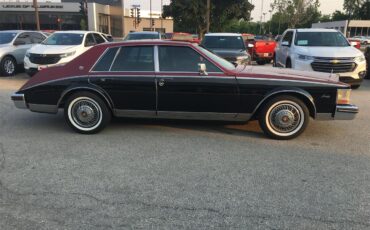 Cadillac-Seville-1985-Two-tone-Red-Black-Dark-Red-9