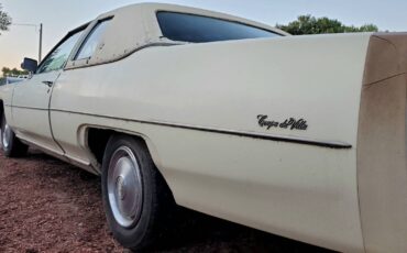 Cadillac-coupe-deville-1976-14