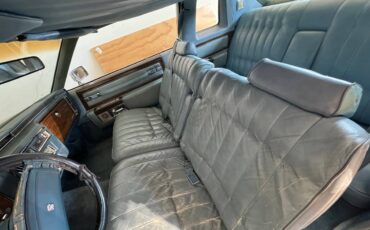 Cadillac-coupe-deville-1977-blue-1