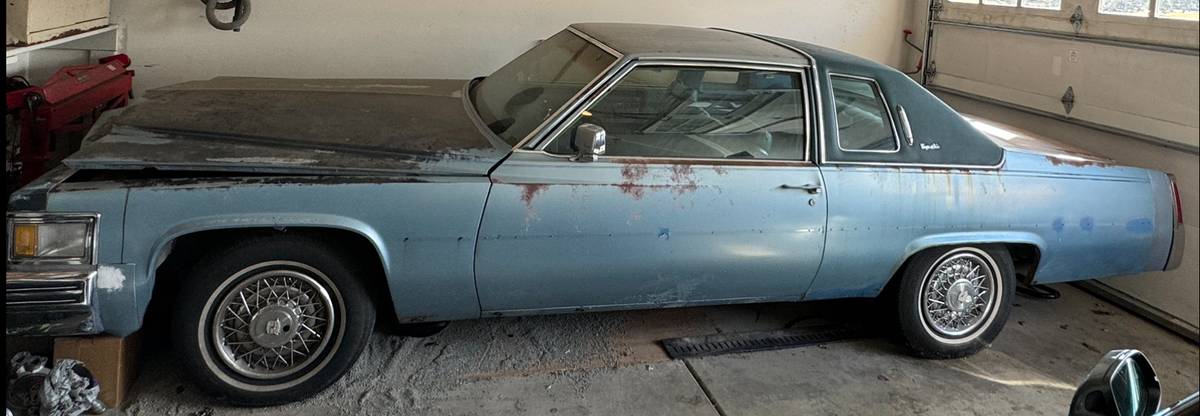 Cadillac-coupe-deville-1977-blue-13