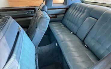 Cadillac-coupe-deville-1977-blue
