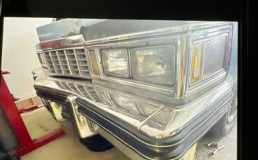 Cadillac-coupe-deville-1977-blue-2