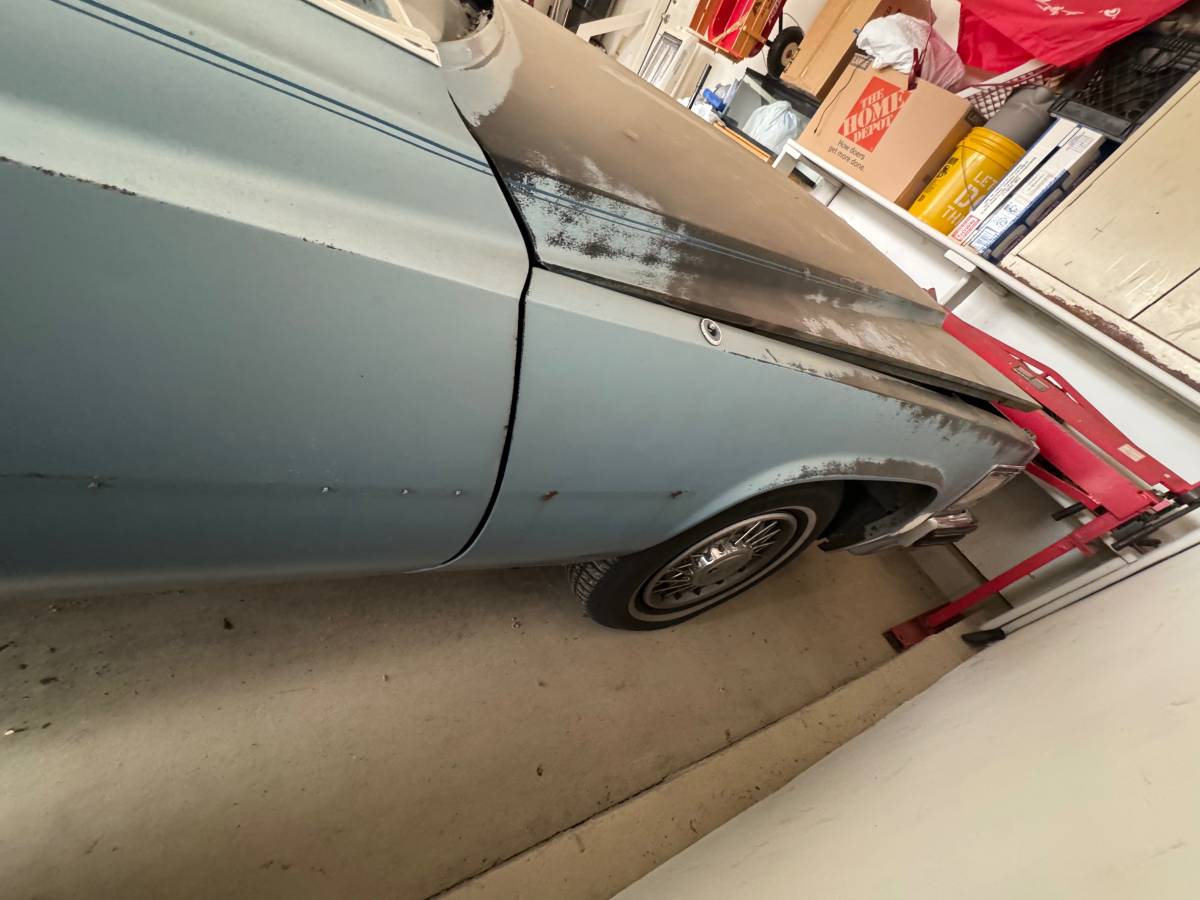 Cadillac-coupe-deville-1977-blue-3