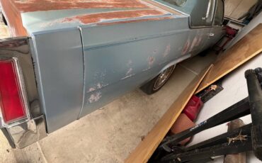 Cadillac-coupe-deville-1977-blue-4