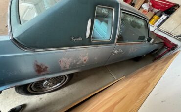 Cadillac-coupe-deville-1977-blue-5