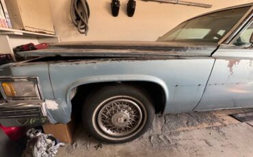 Cadillac-coupe-deville-1977-blue-6