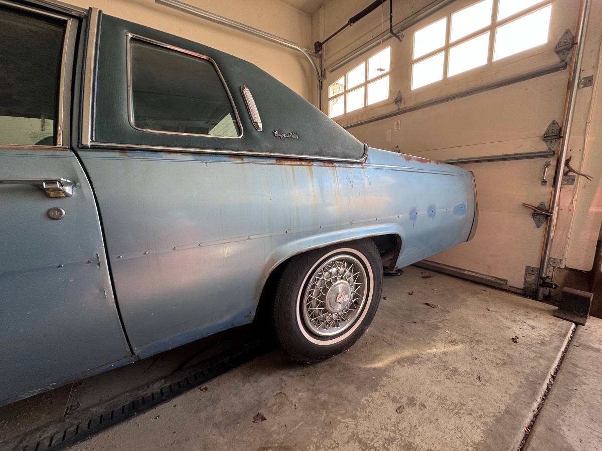 Cadillac-coupe-deville-1977-blue-8