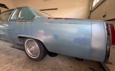 Cadillac-coupe-deville-1977-blue-9