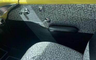 Chevrolet-Bel-air-1957-YellowWhite-Black-Vinyl