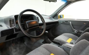 Chevrolet-Beretta-1990-Yellow-Gray