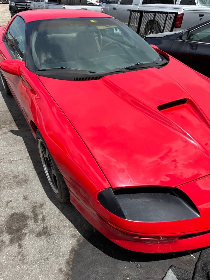 Chevrolet-Camaro-sport-coupe-amp-convertible-1995-red-5