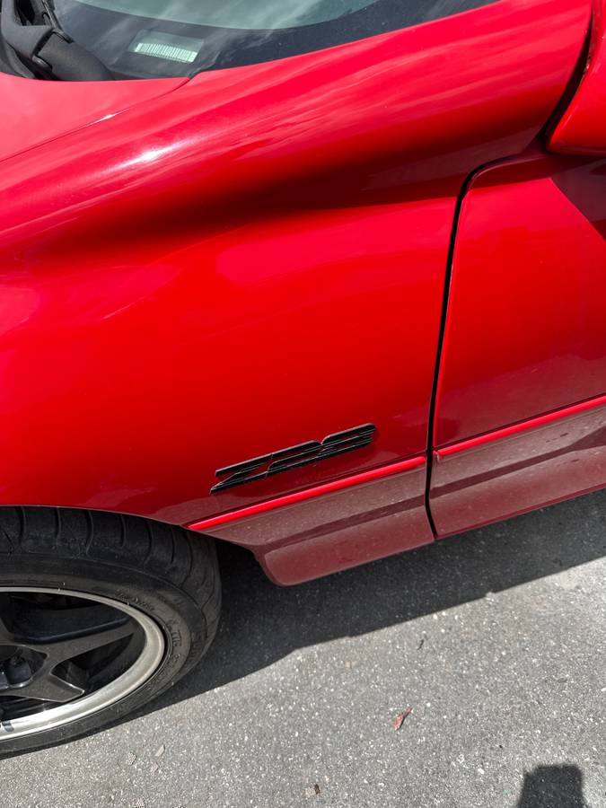 Chevrolet-Camaro-sport-coupe-amp-convertible-1995-red-6