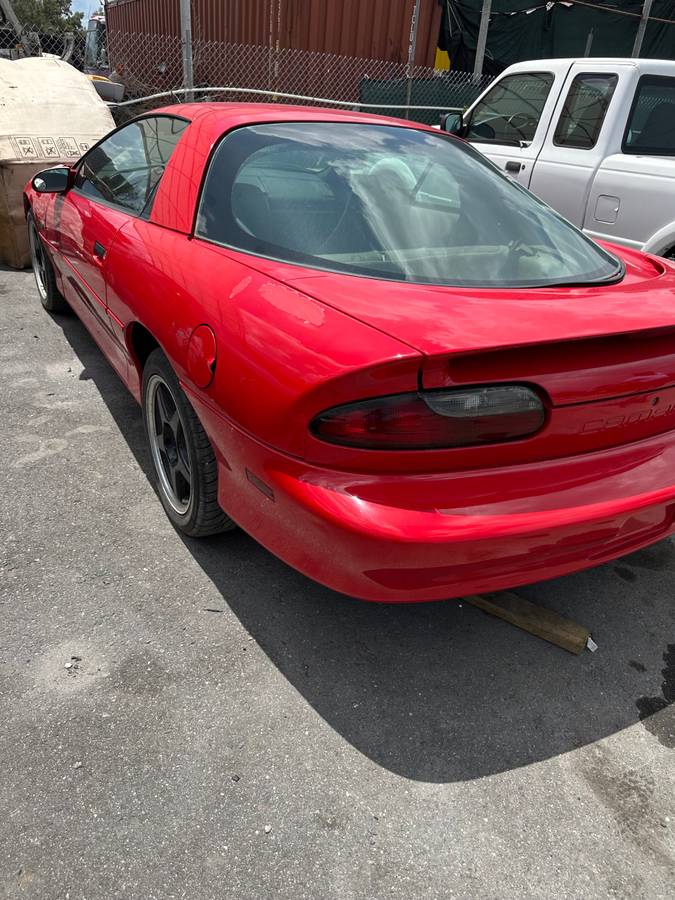 Chevrolet-Camaro-sport-coupe-amp-convertible-1995-red-7