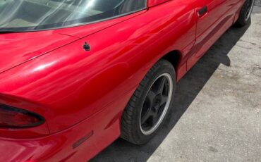 Chevrolet-Camaro-sport-coupe-amp-convertible-1995-red-9