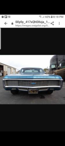 Chevrolet-Caprice-1969-Blue-Teal-Black-Cloth-21