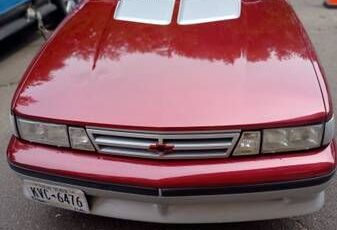 Chevrolet-Cavalier-1989-Red-6