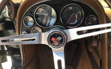 Chevrolet-Corvette-1967-Goodwood-Green-Tan-9