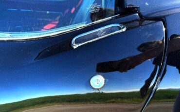 Chevrolet-Corvette-1976-Black-Dark-Red-25