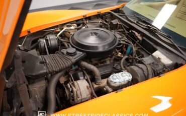 Chevrolet-Corvette-1977-Orange-Metallic-Buckskin-Tan-1